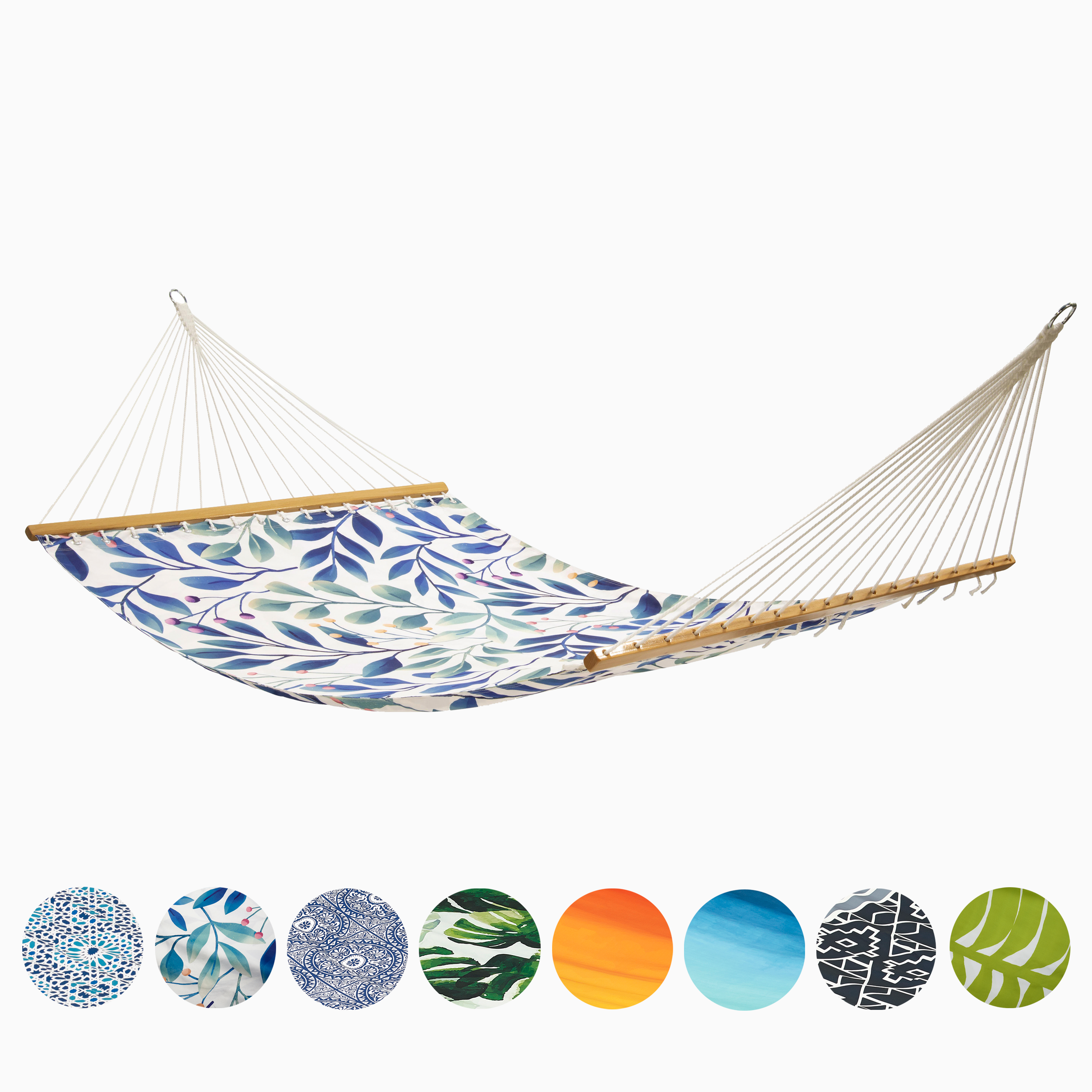 Full view of white and blue leaf print hammock above a row of color and pattern swatches